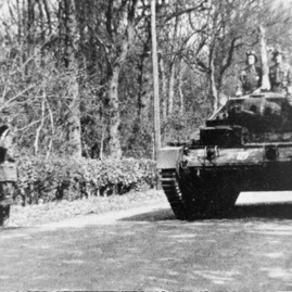 Polish tanks passing the entrance to Stevenson House.jpg